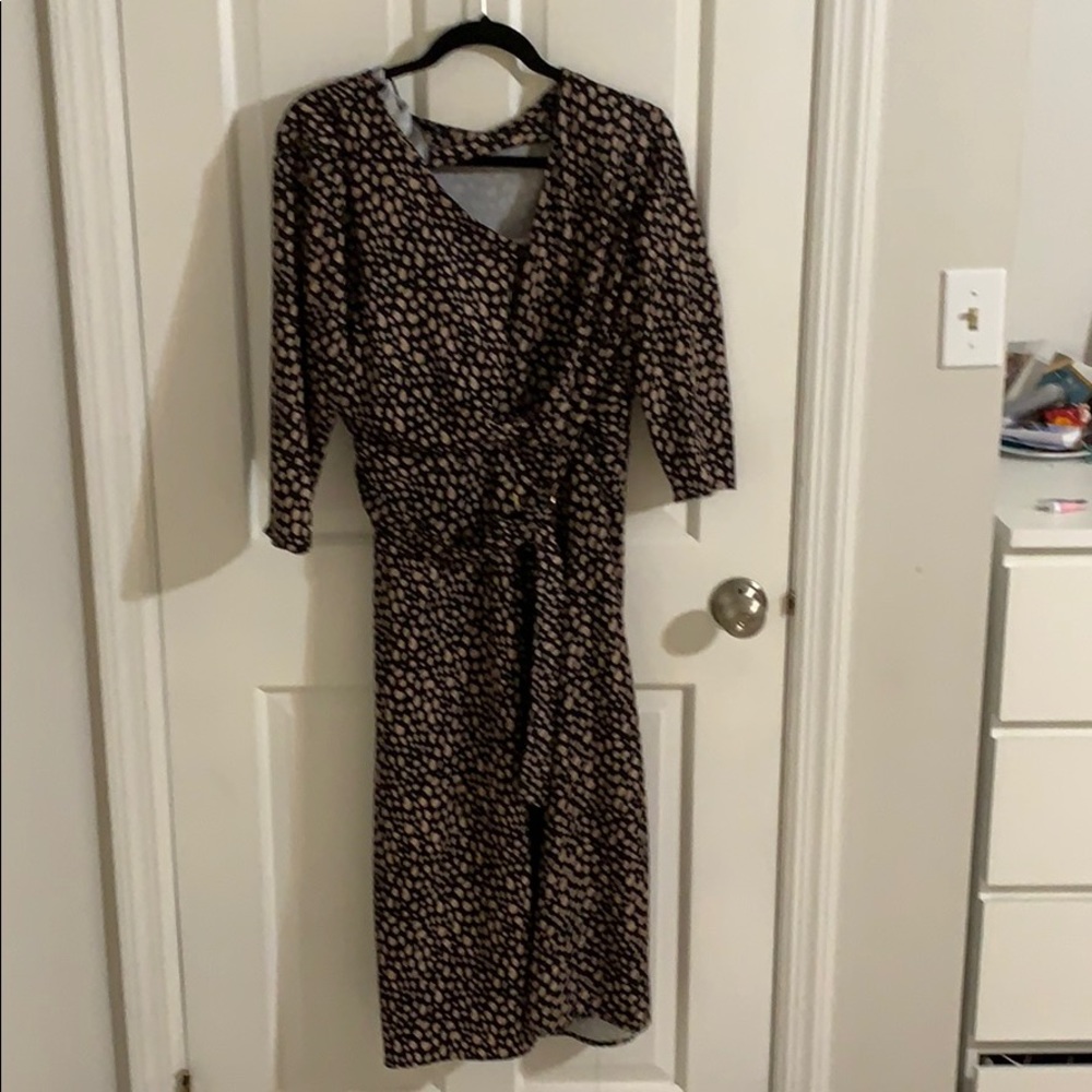 Spanish Dress Black with beige animal print .